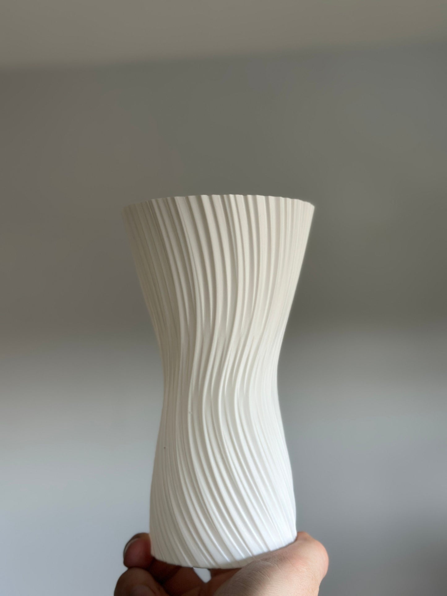ripple vase, geometric texture, nordic sculptural centerpiece, matte tabletop, white