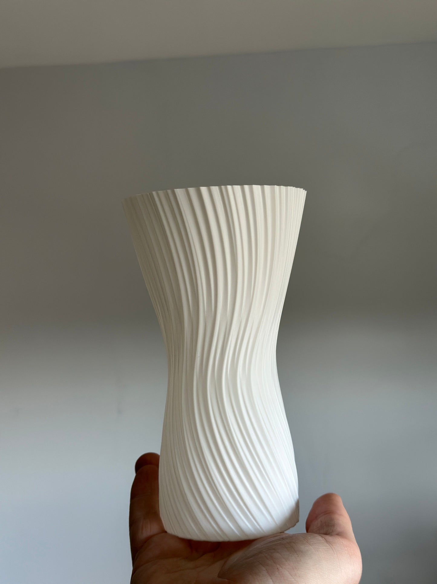 ripple vase, geometric texture, nordic sculptural centerpiece, matte tabletop, white