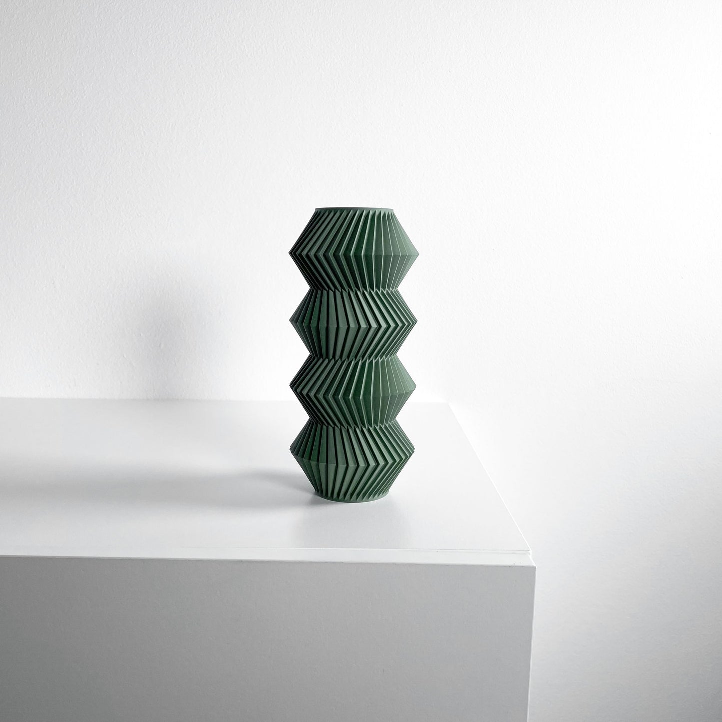 modern vase, minimalist curvilinear bud holder, scandinavian tabletop display, mantel