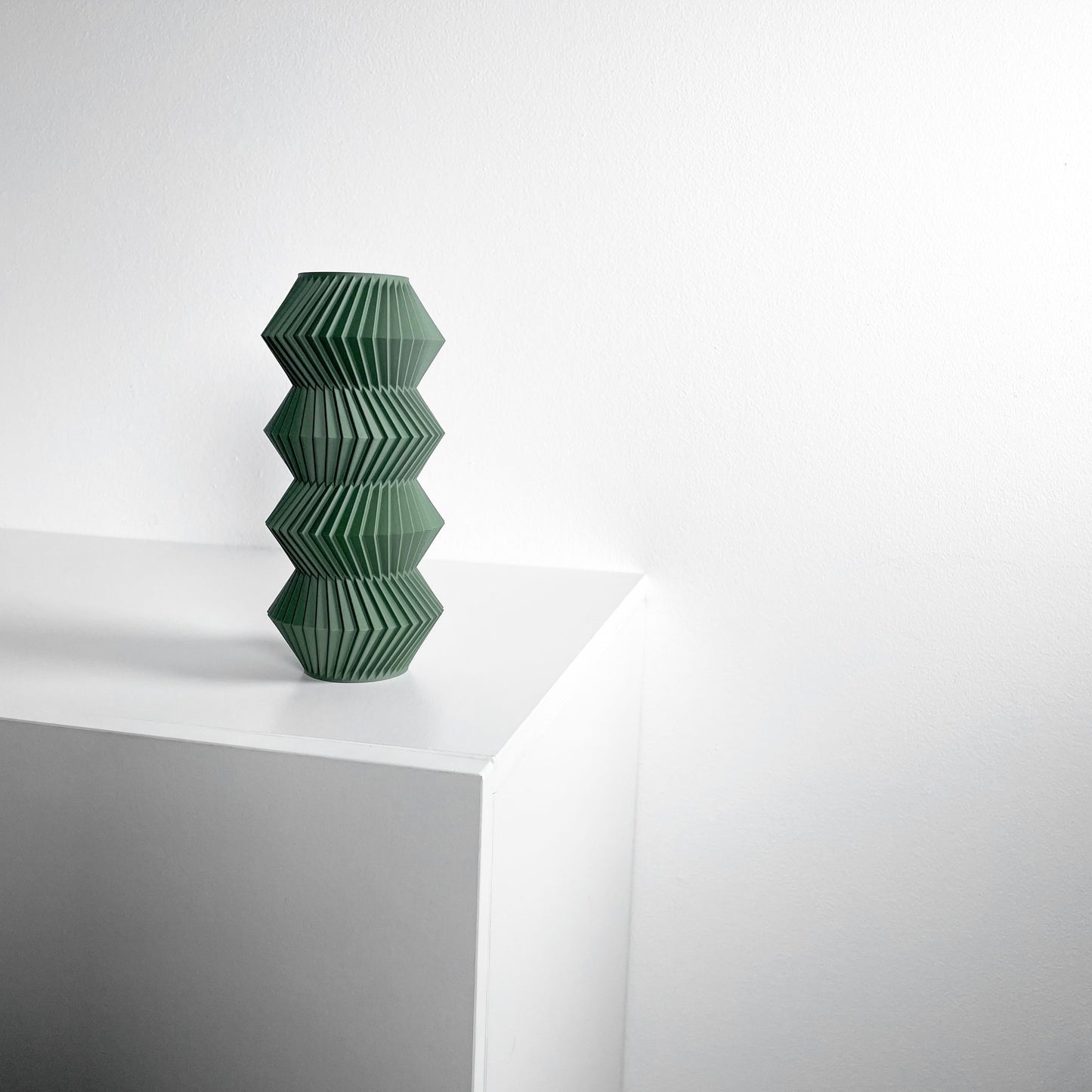 modern vase, minimalist curvilinear bud holder, scandinavian tabletop display, mantel