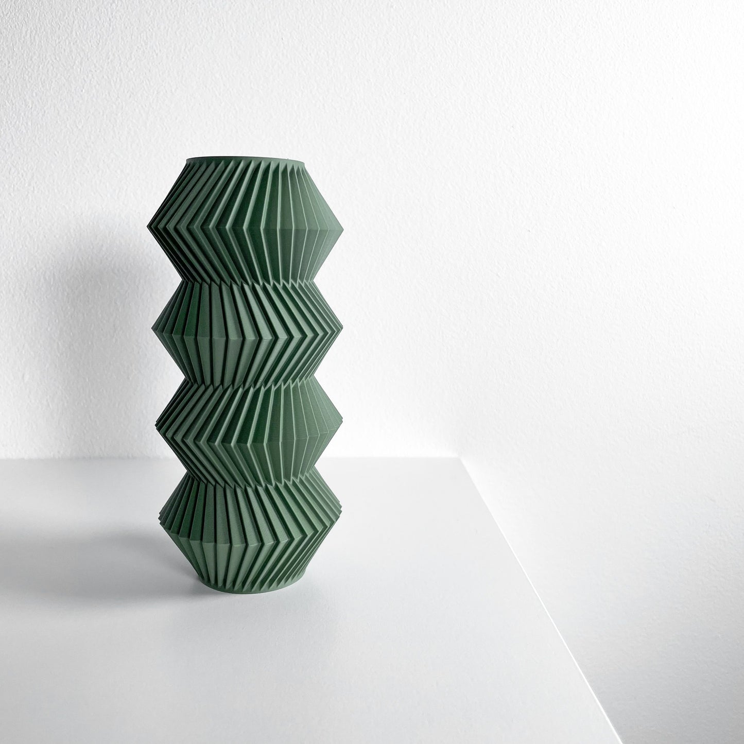 modern vase, minimalist curvilinear bud holder, scandinavian tabletop display, mantel