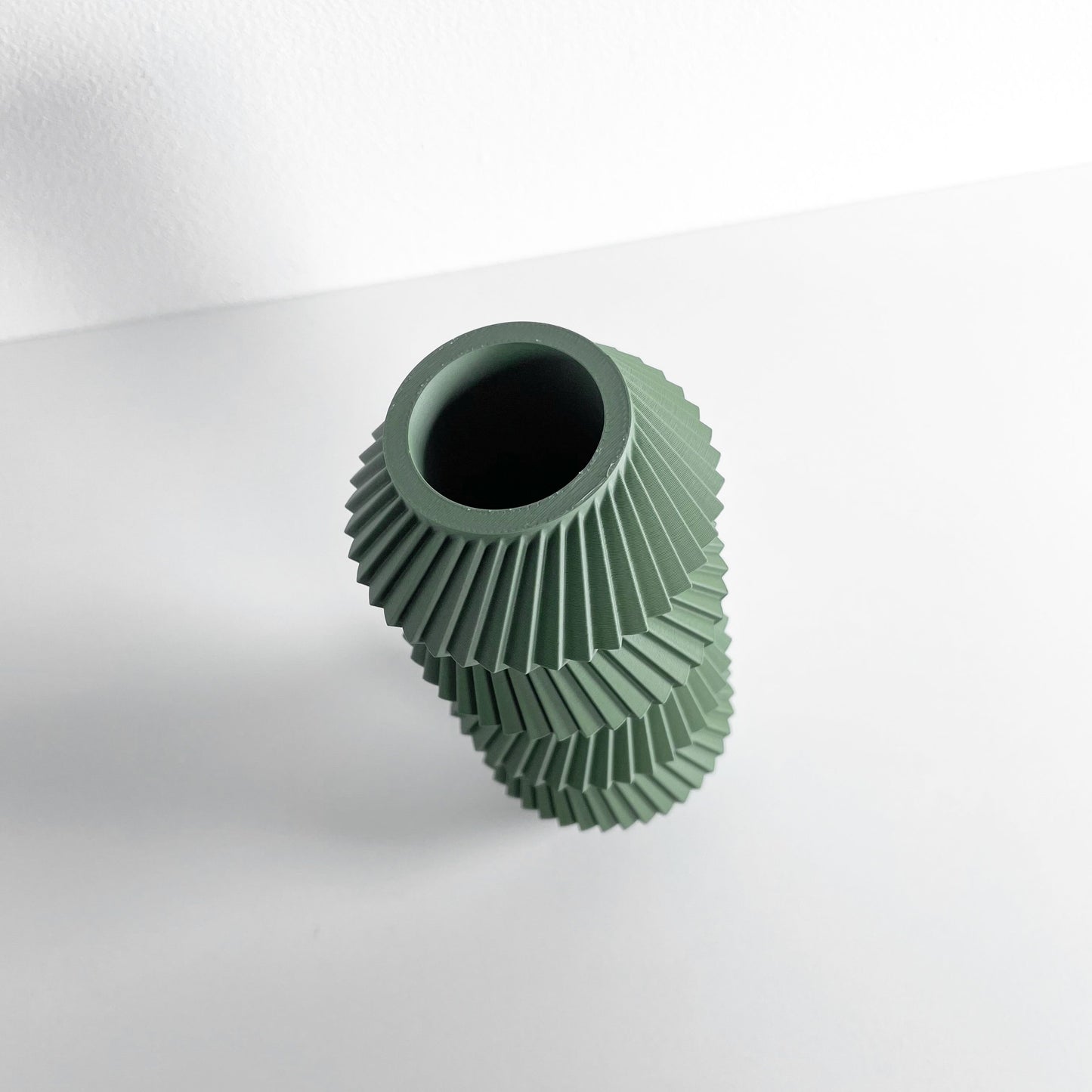 modern vase, minimalist curvilinear bud holder, scandinavian tabletop display, mantel