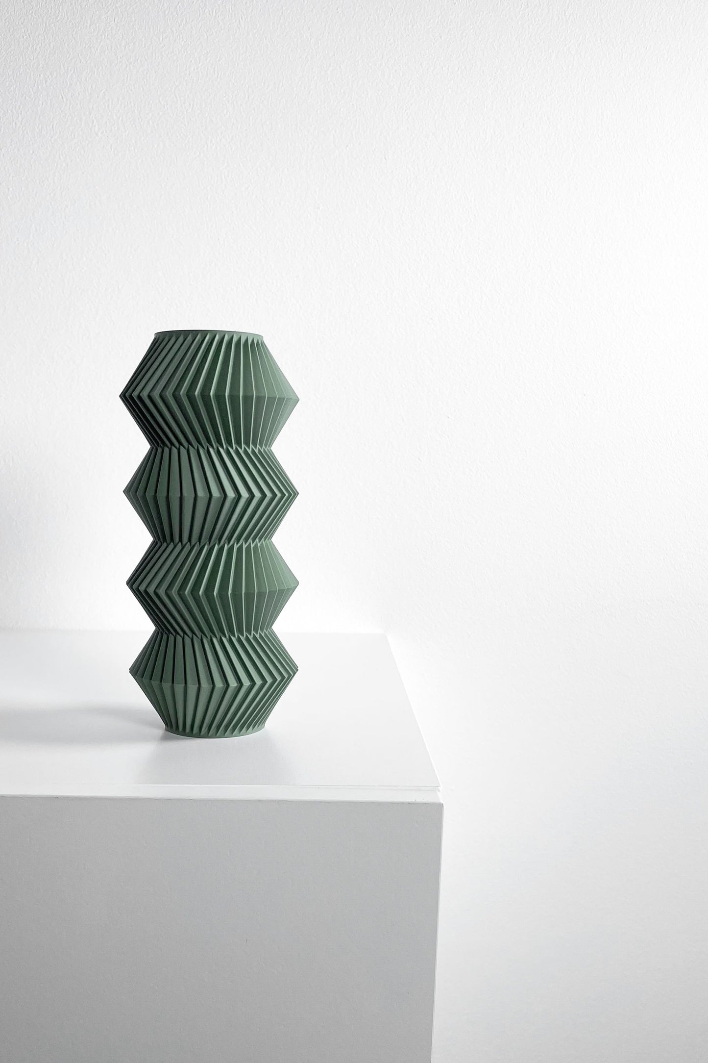 modern vase, minimalist curvilinear bud holder, scandinavian tabletop display, mantel