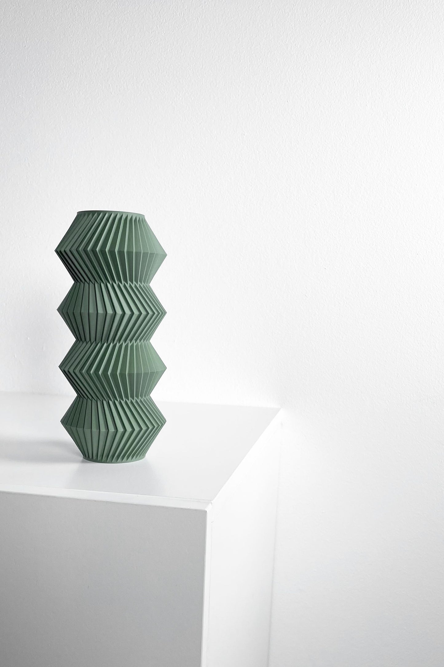 modern vase, minimalist curvilinear bud holder, scandinavian tabletop display, mantel