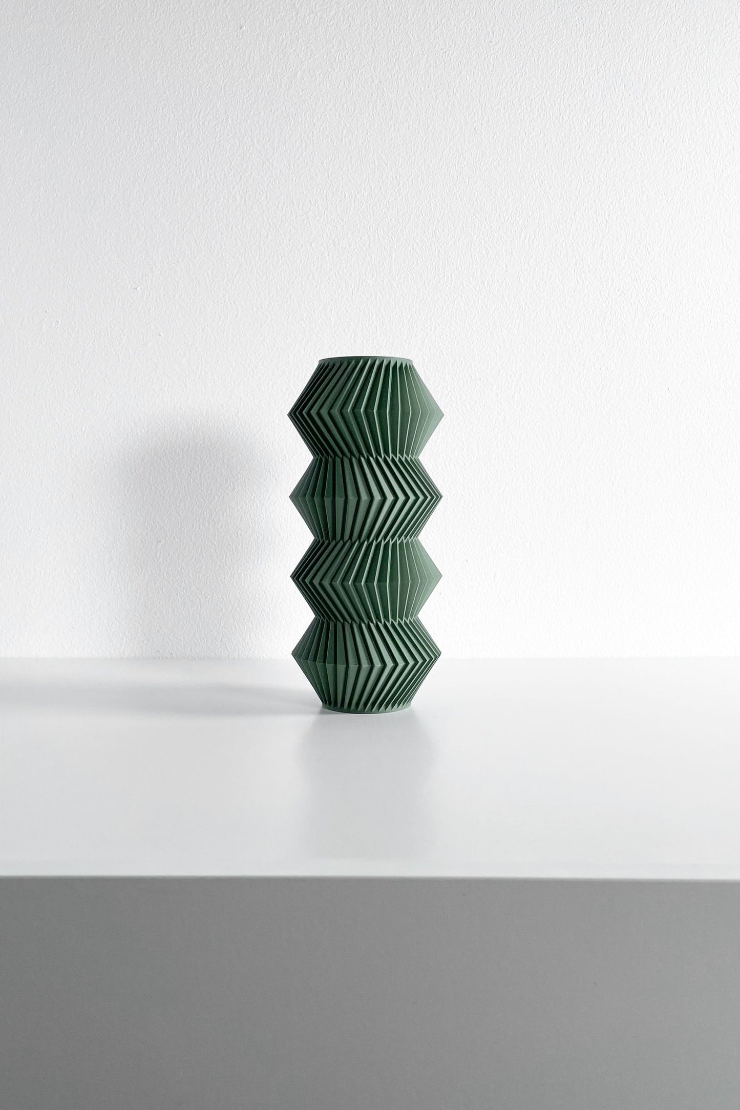 modern vase, minimalist curvilinear bud holder, scandinavian tabletop display, mantel