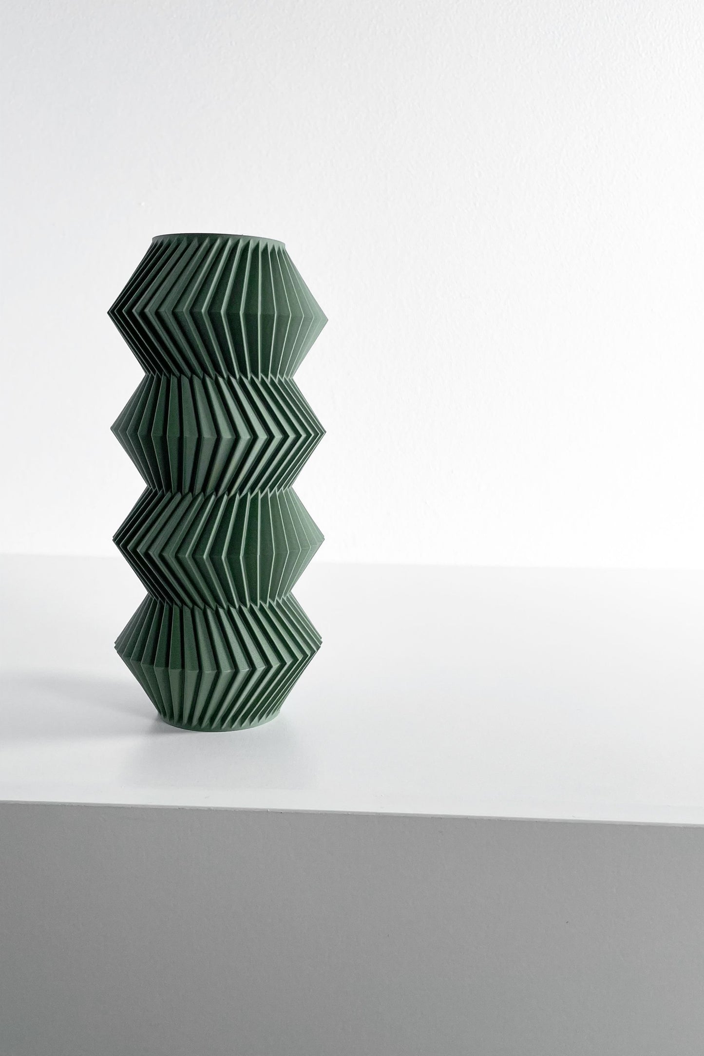 modern vase, minimalist curvilinear bud holder, scandinavian tabletop display, mantel